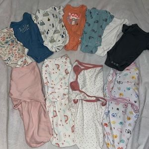 Baby clothing and swaddle lot.